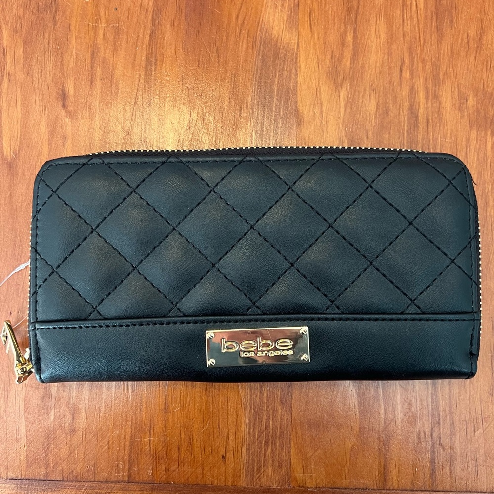 Women’s Bebe wallet brand new.